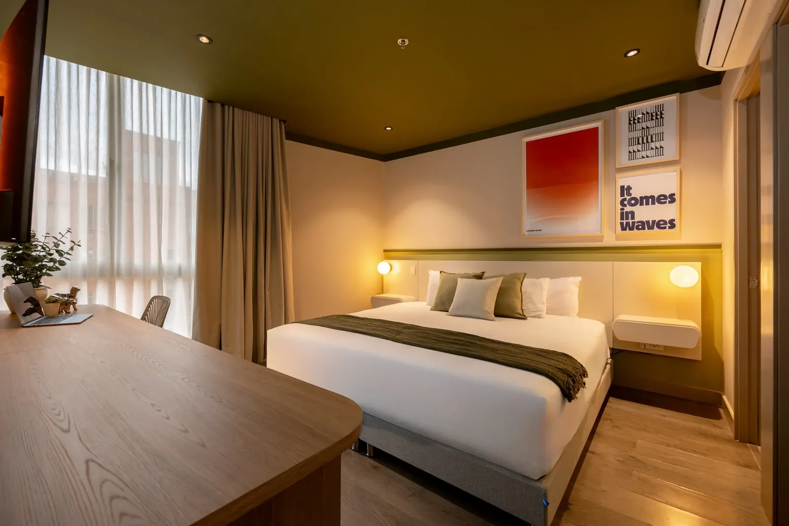 Bedroom with work desk in a Premium apartment at Soul Lifestyle Apartments